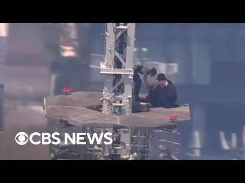 How did two climbers reach the Empire State Building top? thumbnail