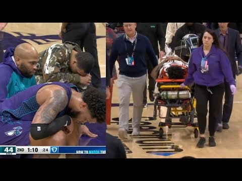 Jaylen Wells stretchered off court after scary fall onto head after dunk vs Hornets 😳 thumbnail