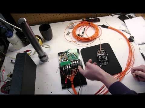 Fiberoptic mouse with quadrature encoders and custom shutter buttons thumbnail