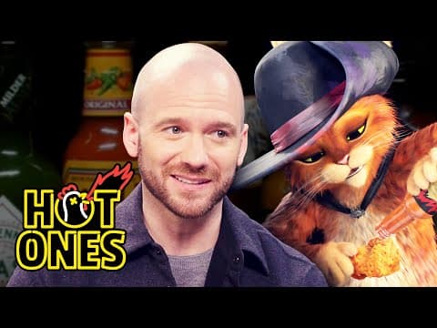 Puss in Boots Can’t Feel His Tail While Eating Spicy Wings | Hot Ones thumbnail
