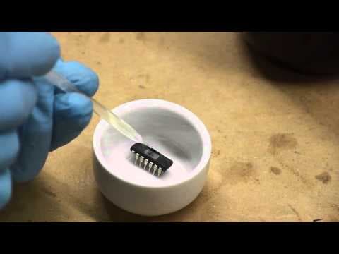 Decapping ICs (removing epoxy packaging from chips to expose the dies) thumbnail