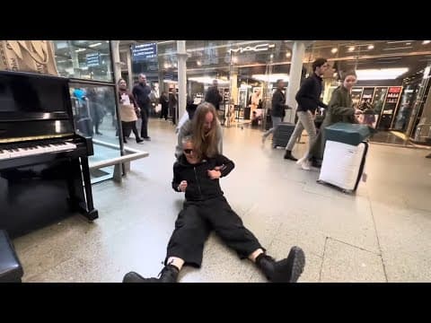 Russian Girl Teaches Piano Dude The Kazotsky Kick thumbnail