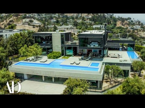 Inside A $55M Mansion With A 15-Car Auto Gallery | On The Market | Architectural Digest thumbnail
